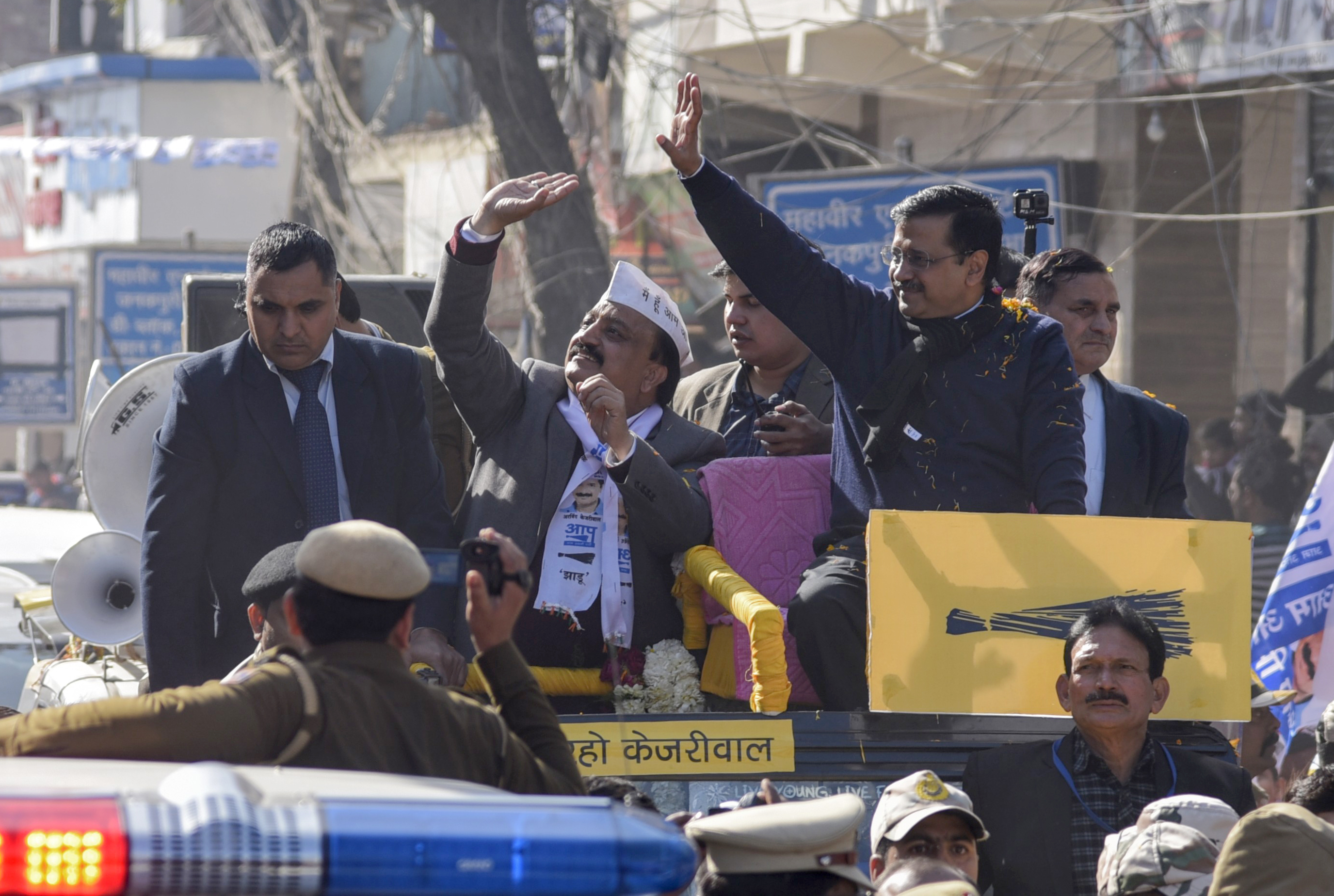 Delhi CM Arvind Kejriwal’s election campaign roadshow | See Pics