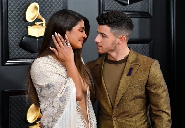 Priyanka Chopra, Nick Jonas sizzle at Grammys in bold plunging gown and gold suit