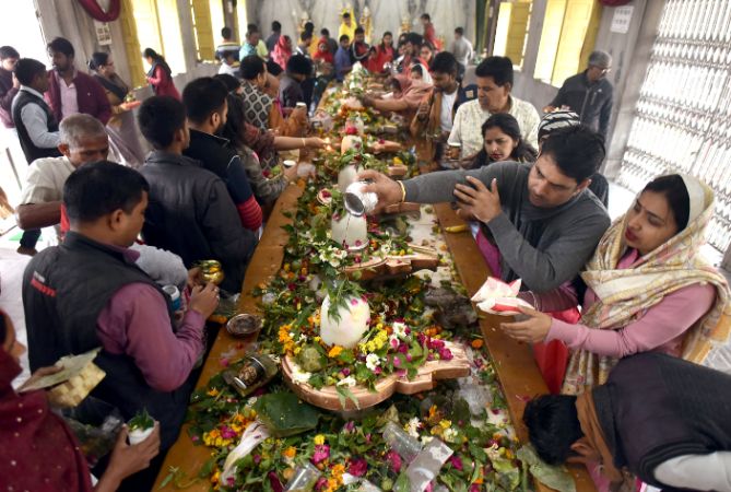 Devotees offers prayers on the occasion of Maha Shivratri