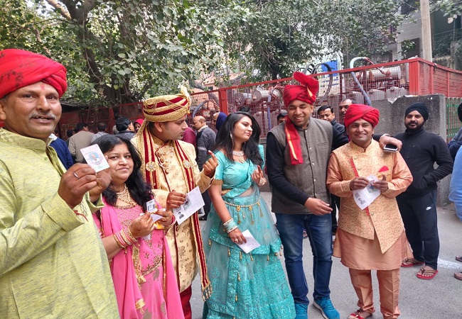Groom, his family dressed up in wedding attire cast vote in Delhi