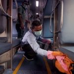 Railway workers clean coaches as a preventive measure against COVID-19 , coronavirus