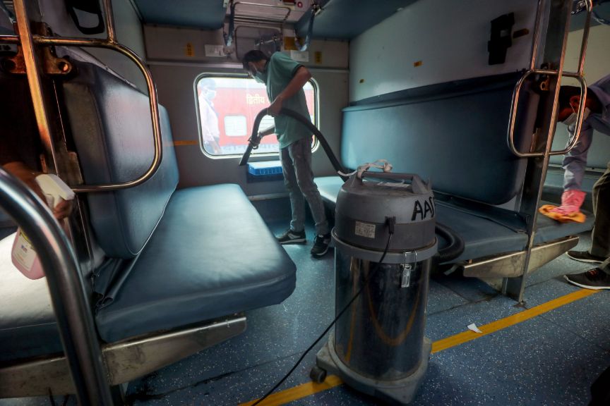 Railway workers clean coaches as a preventive measure against COVID-19 , coronavirus