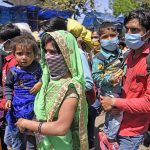Amid lockdown, a sea of migrants in Delhi try to find their way back home