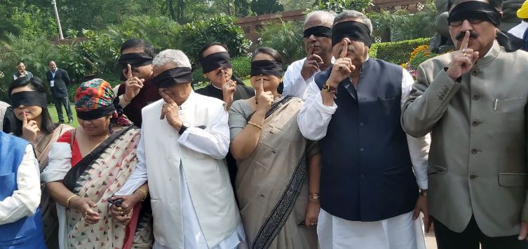 Congress MPs protest in Parliament premises against Delhi violence