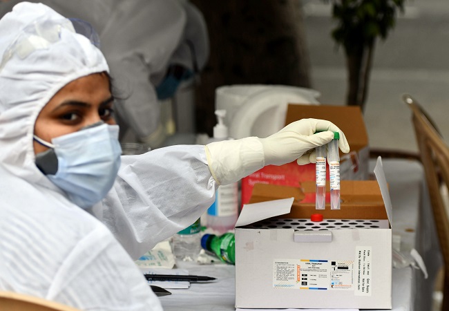 Fighting Covid-19: Gujarat govt cuts RT-PCR tests to Rs 800