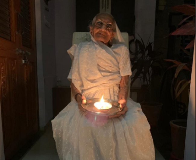 PM Modi’s mother joins nation by lighting diya to mark fight against COVID-19