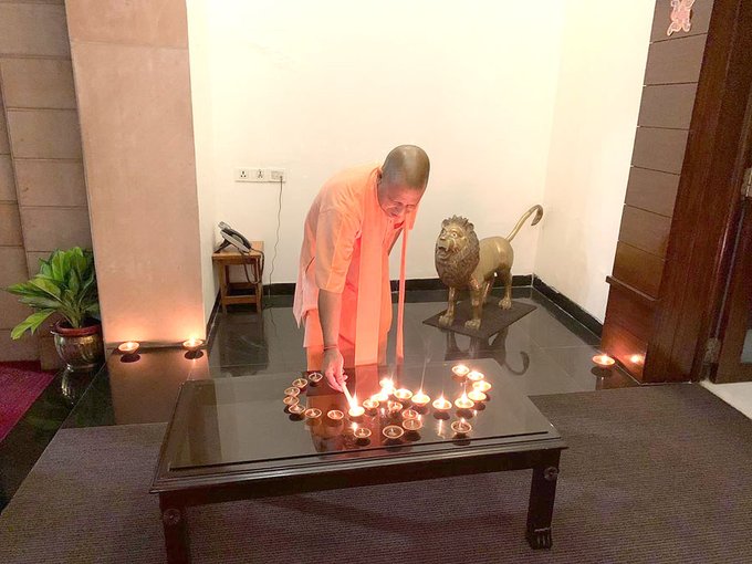 UP CM Yogi Adityanath lights earthen lamps to form Om (Video)