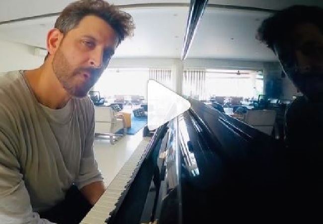 Hrithik Roshan tries hand at piano in special video photobombed by Sussane Khan