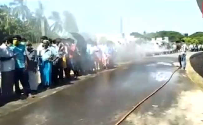 In Tamil Nadu’s Cuddalore, disinfectant sprayed on people buying liquor