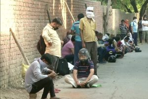 Despite e-token system, long queues and crowd outside liquor shops in Delhi