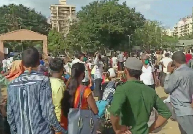 Mumbai: Thousands of migrants gather at grounds in Kandivali in hope of boarding trains