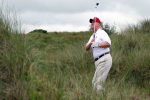 Trump seen golfing at his Virginia club as US death count nears 1 lakh