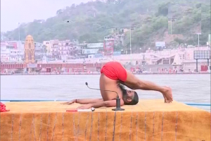 International Yoga Day 2020: Ramdev performs Yogasanas at Patanjali Yogpeeth in Haridwar