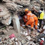 Search and rescue operation underway at the spot where a building collapsed in Kajalpura area of Raigad district on Monday. One dead and seven injured, several others still feared trapped under the debris.