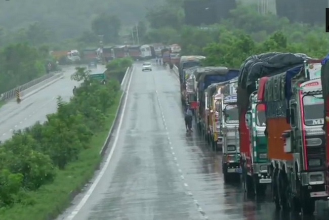 Heavy rains hit normal life, leave trucks stranded on highways