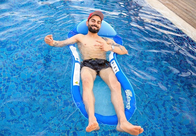 Virat Kohli chills out in UAE heat, calls it a “Proper Day At The Pool”