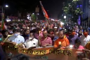 BJP workers hold a candlelight vigil in Kolkata