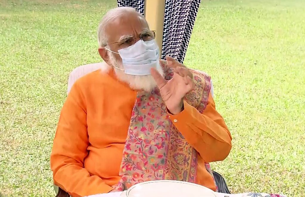 Prime Minister Narendra Modi greets senior BJP leader Lal Krishna Advani at the latter's residence on his birthday