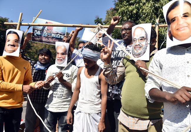 Telangana, Dec 08 (ANI): Left parties' supporters demonstrate in support of the nationwide strike called by Farmers' Unions in Hyderabad on Tuesday. (ANI Photo)