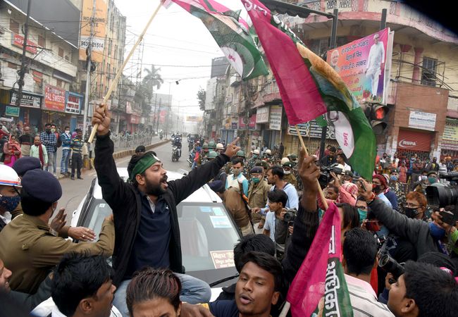 Bihar, Dec 08 (ANI): Jan Adhikar Party supporters demonstrate in support of the nationwide strike called by Farmers' Unions in Patna on Tuesday. (ANI Photo)