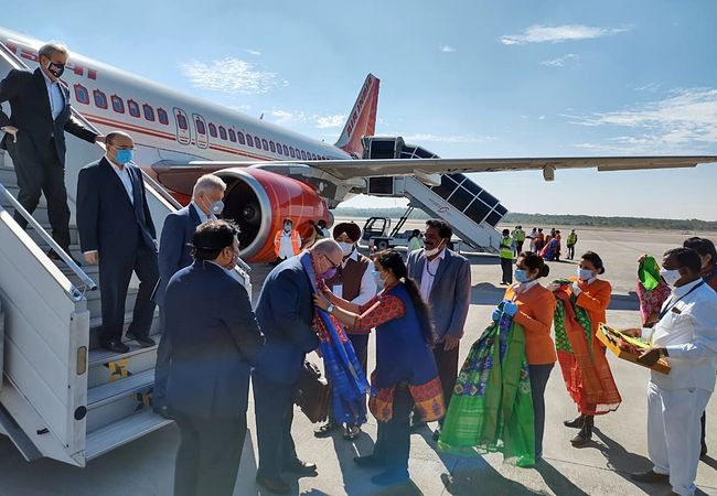 Telangana: A delegation of 80 foreign delegates are welcomed on their arrival at Rajiv Gandhi International Airport (Shamshabad Airport) on a special flight from Delhi, in Hyderabad on Wednesday. (ANI Photo)