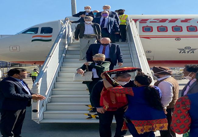 Telangana: A delegation of 80 foreign delegates are welcomed on their arrival at Rajiv Gandhi International Airport (Shamshabad Airport) on a special flight from Delhi, in Hyderabad on Wednesday. (ANI Photo)