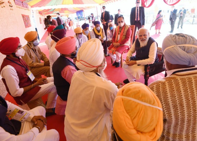 PM Modi meets farmers in Gujarat amid farm laws protest (PICs)