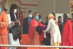 UP CM Yogi Adityanath distributes blankets and warm clothes on the 13th death anniversary of Omlata Devi Shah