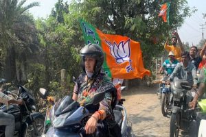 Bengal elections: A day after Mamata, BJP leader Smriti Irani rides a scooter (PICs)
