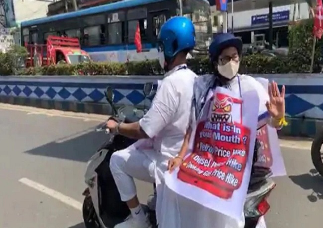 Mamata Banerjee on scooter - Bengal polls
