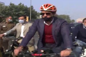 Robert Vadra rides bicycle from Khan Market to his office in protest against the rising fuel prices