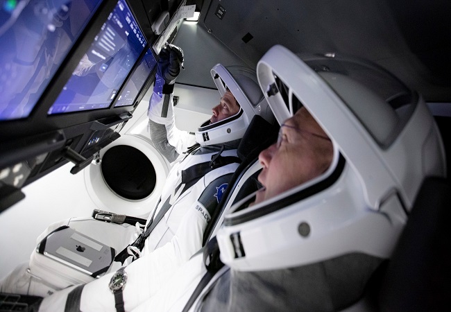 Four flight engineers -- Michael Hopkins, Victor Glover, Shannon Walker and Soichi Noguchi -- docked the SpaceX Crew Dragon spacecraft to the US module last November.