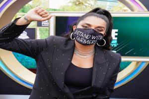 YouTuber Lilly Singh ‘I Stand With Farmers’ mask at 2021 Grammys