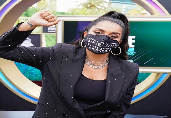 YouTuber Lilly Singh ‘I Stand With Farmers’ mask at 2021 Grammys