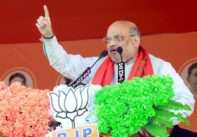 Rahul’s manifesto is to carry Badruddin Ajmal on shoulders and open borders: Amit Shah in poll rally