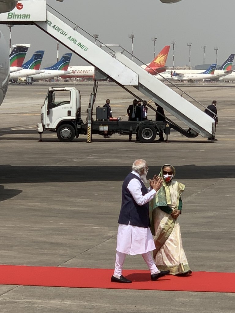 A special visit begins with a special gesture. PM Sheikh Hasina welcomes PM Modi at Dhaka airport.