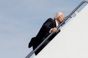 Biden stumbles twice, falls while running up stairs of Air Force One
