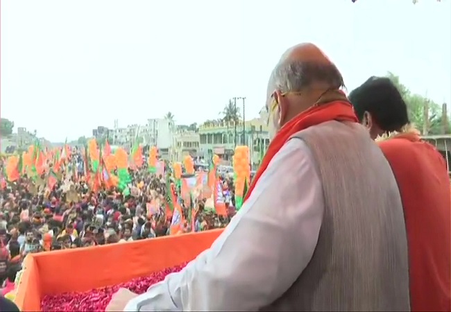 Amid rising covid-19 cases Amit Shah holds massive roadshow in Bengal's Nadia