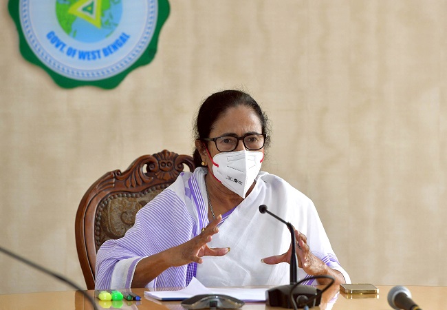 Mamata Banerjee addresses during a press conference