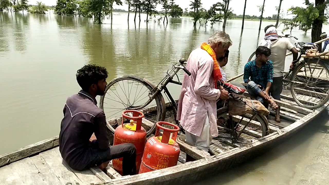 Bihar: About half a dozen villages submerged in floods; See Pics