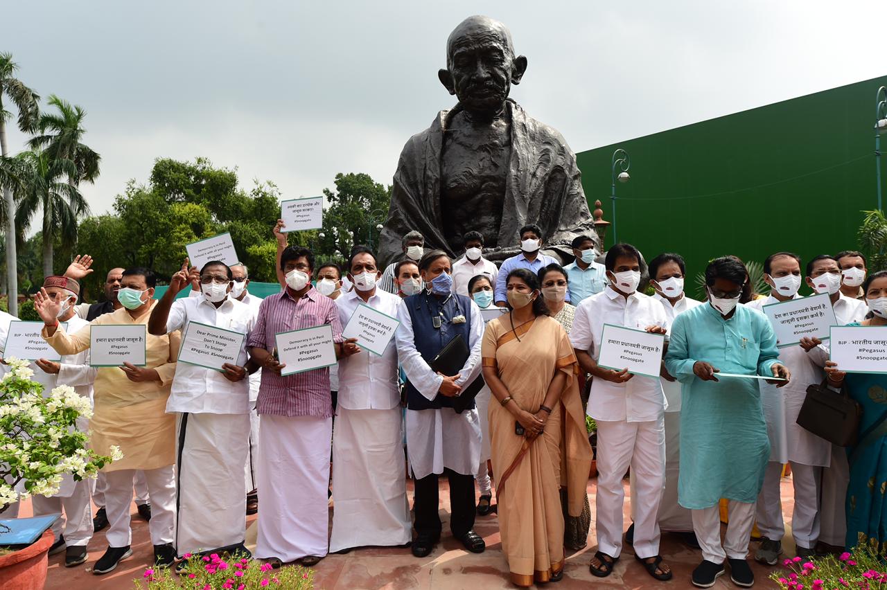 Congress protest against ‘Pegasus Project’ media report in front of Mahatma Gandhi statue inside Parliament premises
