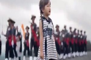 5-year-old girl singing National Anthem with Army band is simply mesmerizing…. WATCH