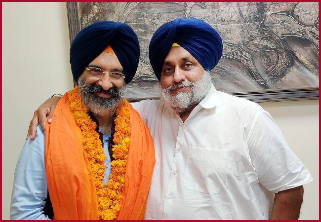 Shiromani Akali Dal President Sukhbir Singh Badal with Delhi Sikh Gurdwara Management committee President (DSGMC) President Manjinder Singh Sirsa after SAD the victory in DSGMC elections, in New Delhi on Wednesday.