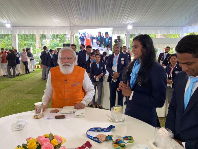 PM Modi fulfils promise, has ice-cream with PV Sindhu