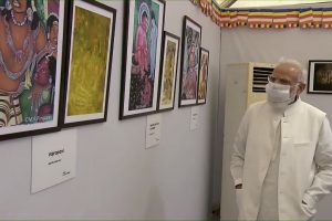 PM Modi walk through the exhibition of paintings; See Pics
