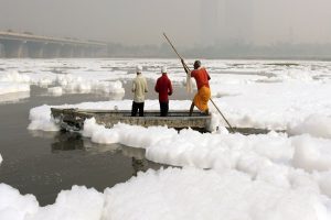 Delhi govt deploys 15 boats to remove toxic foam from Yamuna river