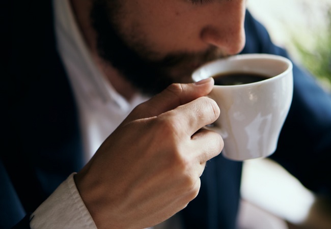 businessman-drinks-coffee