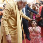 PM Modi with a Divyang in Varanasi