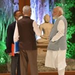 PM Modi interacting with External Affairs Minister and National Security Advisor at his residence in Lok Kalyan Marg