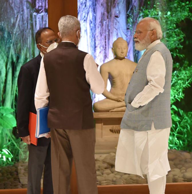PM Modi interacting with External Affairs Minister and National Security Advisor at his residence in Lok Kalyan Marg